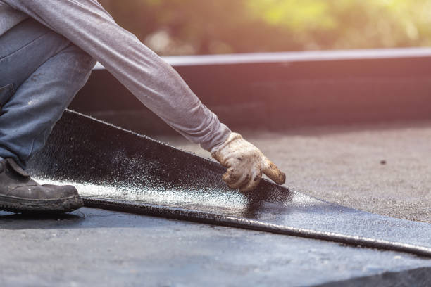Professional Waterproofing technician working in Covington, TN